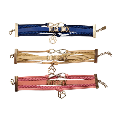 Multi strand leather Ridgeback bracelets in blue, pink and beige with silver charms